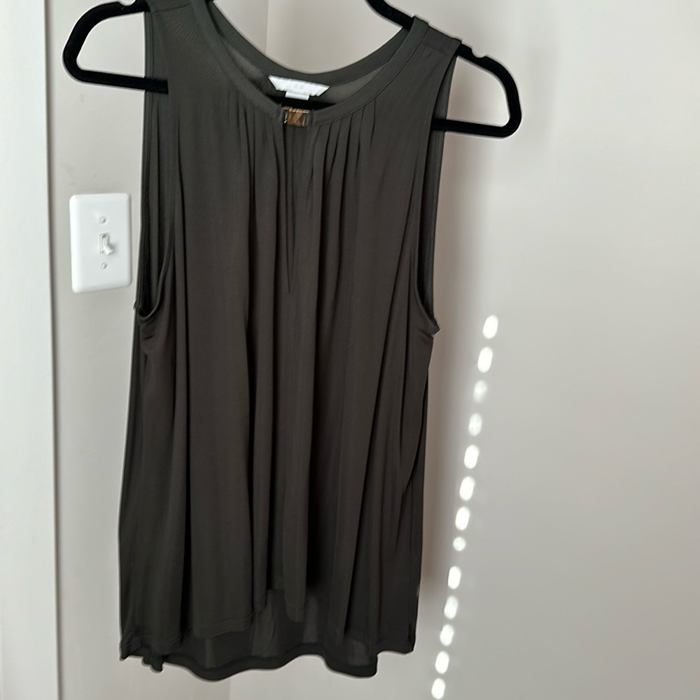 Olive green blouse with with gold tone clasp detail and v neck opening